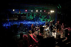 Mashrou' Leila during their album release concert in December 2009 at the DEMCO steel warehouse in Bourj Hammoud, Lebanon[1]