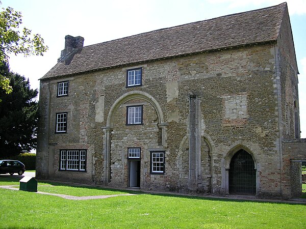 Extant remains of Denny Abbey between Ely and Cambridge, showing similar remnants of adjoining larger and smaller Norman arches, side by side