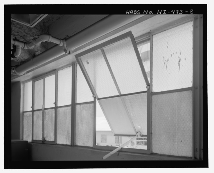 File:Detail of the center axis pivot-windows set over the main entry. View facing southeast - U.S. Naval Base, Pearl Harbor, Paint and Oil Storehouse, Avenue D near Seventh Street HABS HI-493-8.tif