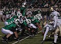 Marshall Thundering Herd quarterback reading the UAB Blazers defense