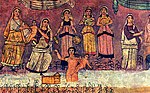 Une des fresques de la synagogue de Doura Europos : Moïse bébé est recueilli d'un panier flottant sur un cours d'eau par la fille d'un pharaon, elle-même entourée de suivantes.