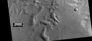 Hollows formed by erosion on floor of crater, as seen by HiRISE under HiWish program.