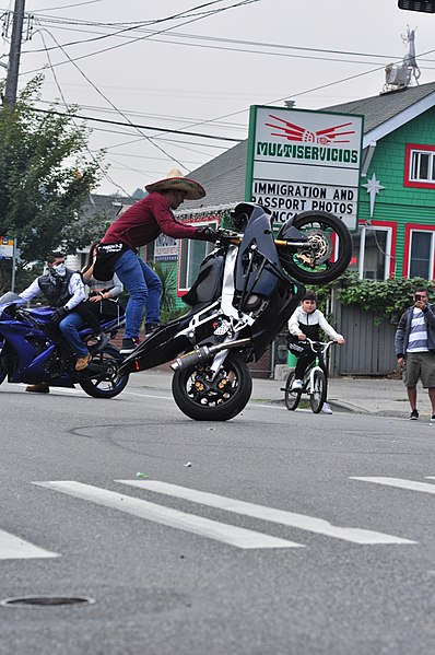 File:Fiestas Patrias Parade, South Park, Seattle, 2017 - 208 - Hollywood B and the West Coast Connections stunt team.jpg