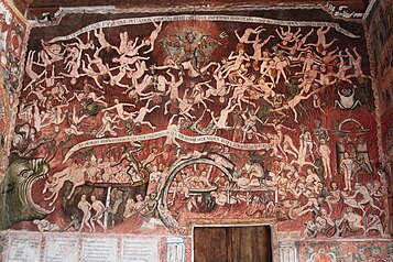 Preserved wall painting of 1802 depicting the Hell,[97][98][99] by the Peruvian mestizo painter Tadeo Escalante, inside the Church of San Juan Bautista in Huaro, Peru. The church's interior is full of wall paintings.