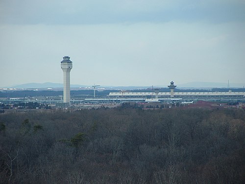 The current air traffic control tower dwarfs the original one.