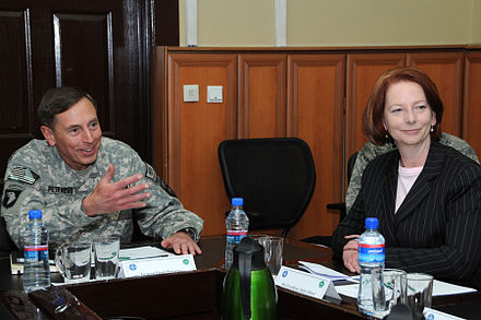 Gillard with General David Petraeus, the commander of the International Security Assistance Force, during a visit to Afghanistan on 2 October 2010