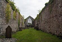 The ruined nave of the abbey, looking east Killagh Priory St. Mary de Bello Loco Nave 2012 09 10.jpg