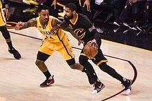 Teague (left) with the Pacers in February 2017, guarding Kyrie Irving. Kyrie Irving (32963168585).jpg