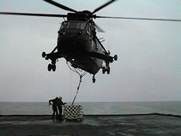 A Sea King of 846 NAS lifting load during exercise "Ocean Wave '97".