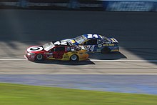 Larson and Chase Elliott battle for the lead during the 2017 FireKeepers Casino 400 Larson and Chase Elliott Battle for the lead in the Firekeepers 400..jpg