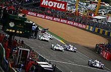 Alexander Wurz leads the field at the start Le Mans Start 2014.jpg