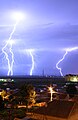 Image 22Cloud-to-ground lightning. Typically, lightning discharges 30,000 amperes, at up to 100 million volts, and emits light, radio waves, x-rays and even gamma rays. Plasma temperatures in lightning can approach 28,000 kelvins. (from Atmospheric electricity)