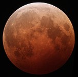 The Moon, tinted reddish, during a lunar eclipse