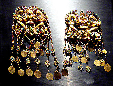 The treasure of the royal burial Tillia tepe is attributed to 1st century BC Sakas in Bactria.