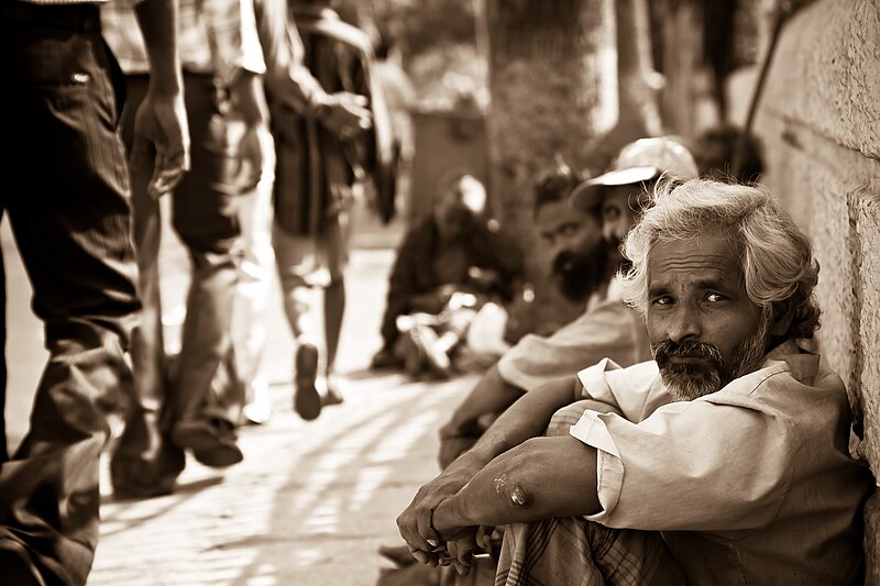 File:Men seated on the ground in Mylapore, Chennai, Tamil Nadu, India - 20080511.jpg