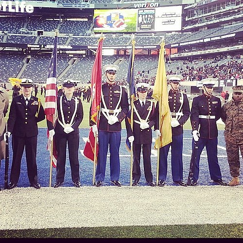 Cadets from Elizabeth High School's MCJROTC and Linden High School's NJROTC hold a joint honor guard colors posting ceremony at MetLife Stadium in Eas