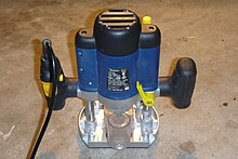 Modern plunge router showing dust extraction tube Modern plunge router.jpg