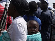 Mother and child in Sudan Mother and child on South Sudans independence day (5926201660).jpg