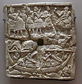 Bas-relief of a banquet and boating scene, 3000-2334 BCE, Kish (Sumer).[73]