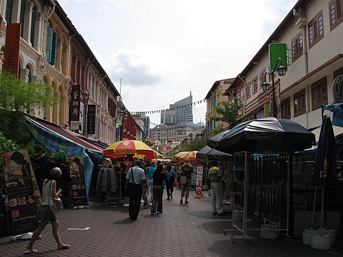 Restored shophouses running along a street in Chinatown, which reflects the Victorian architecture of buildings built in Singapore during the earlier colonial period, with styles such as the painted ladies.