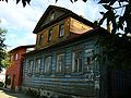 Casa de madeira na rua.  Lênin