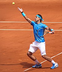 Rafael Nadal defending his Roland Garros title for the record-tying sixth time. Rafa Nadal 2011 FO R1.jpg