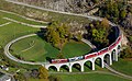 Image 18Brusio spiral viaductPhoto: David GublerThe Bernina Express passing over the Brusio spiral viaduct. Located near Brusio, Graubünden, Switzerland, the single track nine-arched stone spiral railway viaduct was opened in 1908. It is part of the World Heritage-listed Bernina railway.More selected pictures