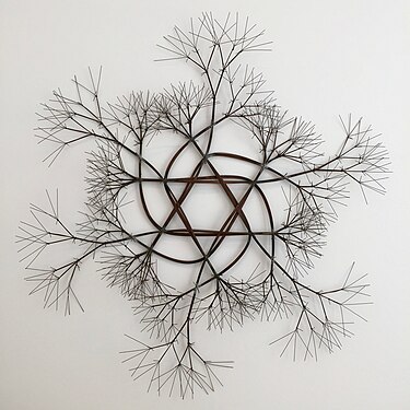 Untitled (S.383, Wall-Mounted Tied Wire, Open-Center, Six-Pointed Star, with Six Branches), c. 1967.