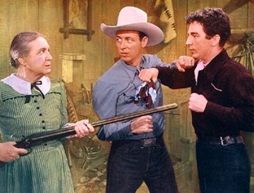 Sarah Padden, Eddie Dean, and Lash LaRue in Song of Old Wyoming (1945).