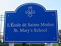 Bilingual school sign