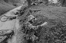 Swiss bicycle infantry armed with the Stgw 57 in 1975. Swiss Bicycle Infantry (Militarradfahrer) in 1975.jpg