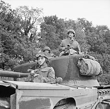 Lt Fathergill, OC 'B' Squadron, 107 RAC, 34th Tank Brigade, with his crew on their Churchill tank, 17 July 1944. The British Army in Normandy 1944 B7635.jpg