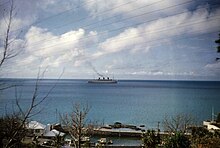 The S.S. Queen of Bermuda departing the island in December 1952~January 1953. The Devonshire Dock is in the foreground. The Queen of Bermuda departing the island in December 1952 or January 1953.jpg