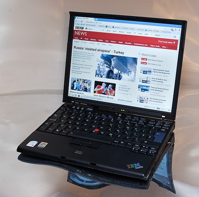 A photograph showing an open Lenovo ThinkPad X60s