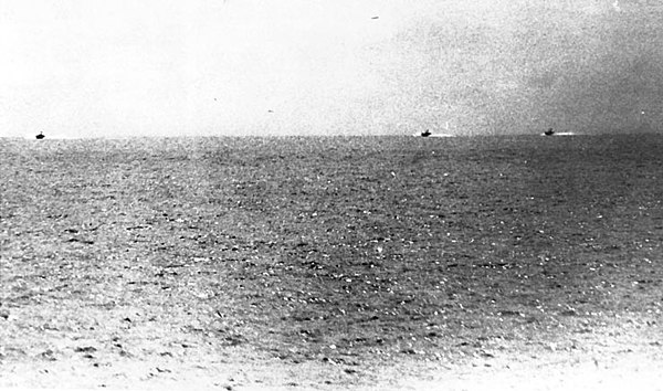 Photo taken from USS Maddox during August 2 encounter, showing three North Vietnamese motor torpedo boats.