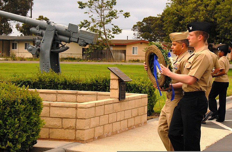 File:U.S. Navy Capt. Larry Vasquez, commanding officer of Naval Base Ventura County, helps hold a wreath during a ceremony honoring the Battle of Midway at Naval Base Ventura County, Calif., June 4, 2013 130604-D-QK571-276.jpg