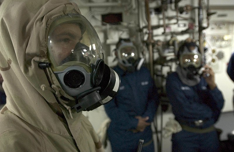 File:US Navy 060617-N-9851B-006 Seaman Christopher Smith wears an Advanced Chemical Protective Garment (ACPG) before exiting the skin of the ship as part of an external investigation team.jpg