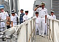 Royal Brunei Navy members exit across the bow of USS Dewey (DDG-105) during CARAT 2011.