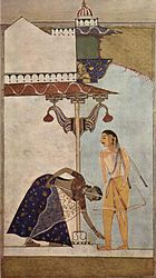 امرأة هندية تلمس أقدام رجل، تقليدًا لإظهار الاحترام الذي هو جزء لا يتجزأ من الثقافة. كما رسمها فنان هندي غربي حوالي 1530.