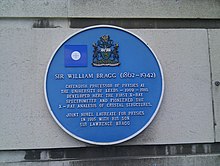 Blue Plaque commemorating the work of William Henry Bragg, featuring the IOP coat of arms William Bragg blue plaque.jpg