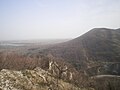 Изглед към Преславската планина и прохода „Боаза“ (вдясно), а в далечината язовир „Поляница“