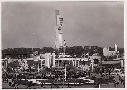 1938 Empire Exhibition view over the South Bandstand in Bellahouston Park, Glasgow, centre left the Garden Club, ICI Pavilion and others and Tait`s Tower overhead.