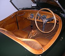 A 1950 aluminium-bodied XK120 that was formerly owned by Clemente Biondetti. It is equipped with competition seats and a Moto-Lita aftermarket steering wheel; positions of tachometer and speedometer have been reversed 1950 Jaguar XK120 interior.jpg