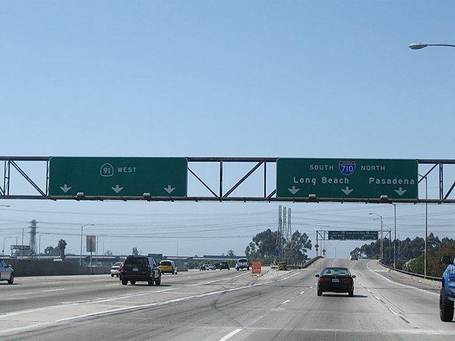 Westbound Artesia Freeway (SR 91) at the interchange with the Long Beach Freeway (I-710) in August 2013