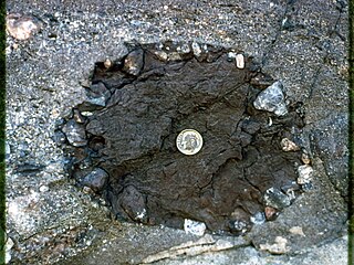 <span class="mw-page-title-main">Armored mud ball</span> Sedimentary structure