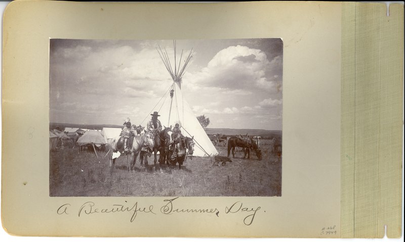 File:A Beautiful Summer Day,' a Man and Two Children in Fancy Traditional Dress Mounted on Horses (a4863ecfd22d4a79bd0d79385589f4d6).tif