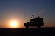 A Land Rover of the Royal Corps of Signals testing the new BOWMAN communications system in 2006. The BOWMAN is currently used by the squadron in addition the BGAN Inmarsat satellite communications system. A day with the Royal Corps of Signals MOD 45147103.jpg