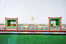 Wall painted with Al-Qatt Al-Asiri Al-Qatt Al-Asiri Wall Art.jpg