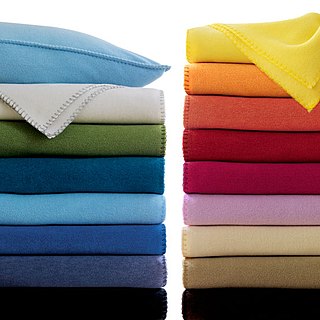 Polar fleece insulating napped or pile fabric, sometimes knitted and often made from polyester