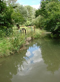 The Ardre at Crugny, at the point where a stream joins the river. A sluice has been inserted. This would enable the controlled watering of the pasture at times when the tributary stream had dried up.